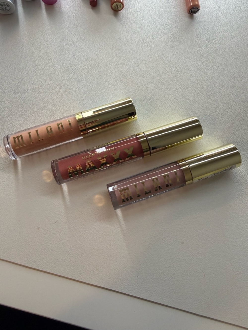 Milani Lip Gloss Trio in Nude, Mauve & Peachy Pink